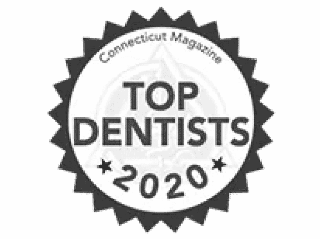 A black sunburst symbol with a white center. Text reads, "Connecticut Magazine Top Dentists 2020".