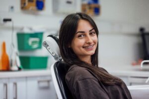 Girl smiling with Braces
