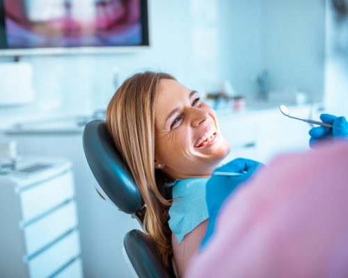 Close up of a young woman having a dentist appointment